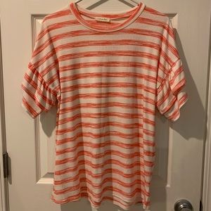 Coral and white ruffle sleeve top